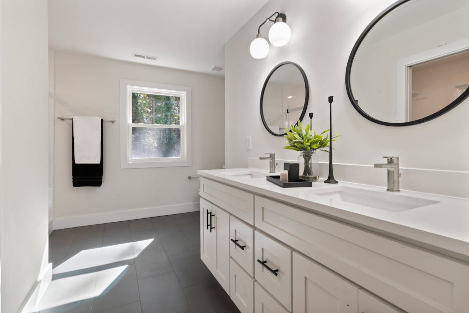 Elegant double sink vanity and bathtub replacement